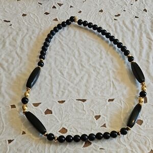 Elegant Black Bead Necklace with Gold Accents